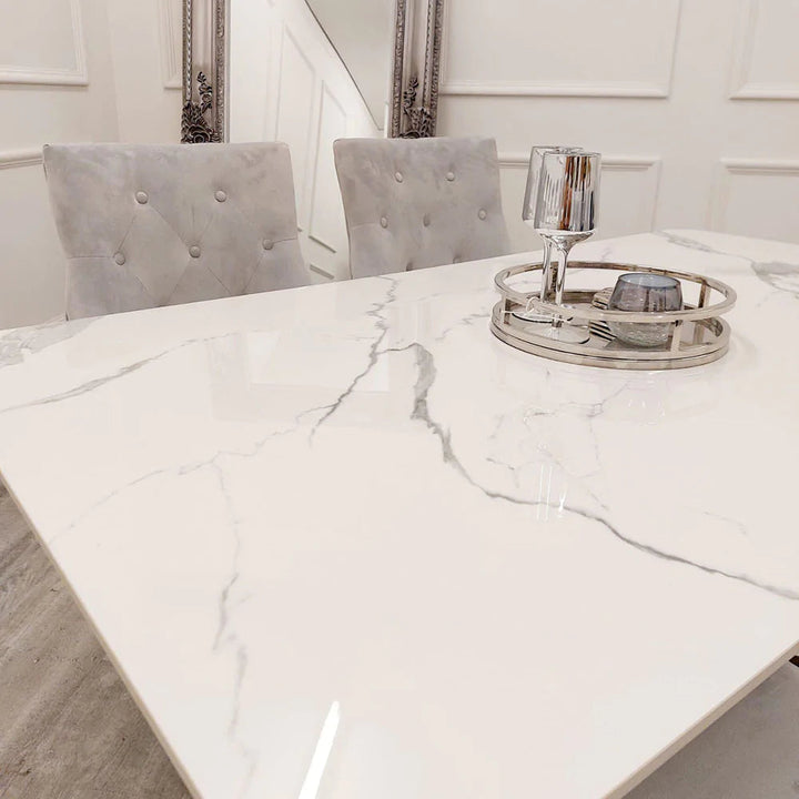 Lucien 160cm Chrome Dining Table with Polar White Sintered Stone Top + Chrome Quilted Back Lion Knocker Dining Chairs - Belmont Interiors