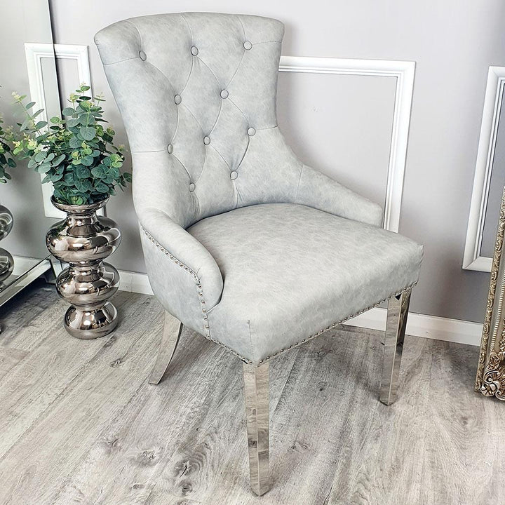 Megan Light Grey PU Dining Chair Faux Leather Lion Knocker Chrome - Belmont Interiors